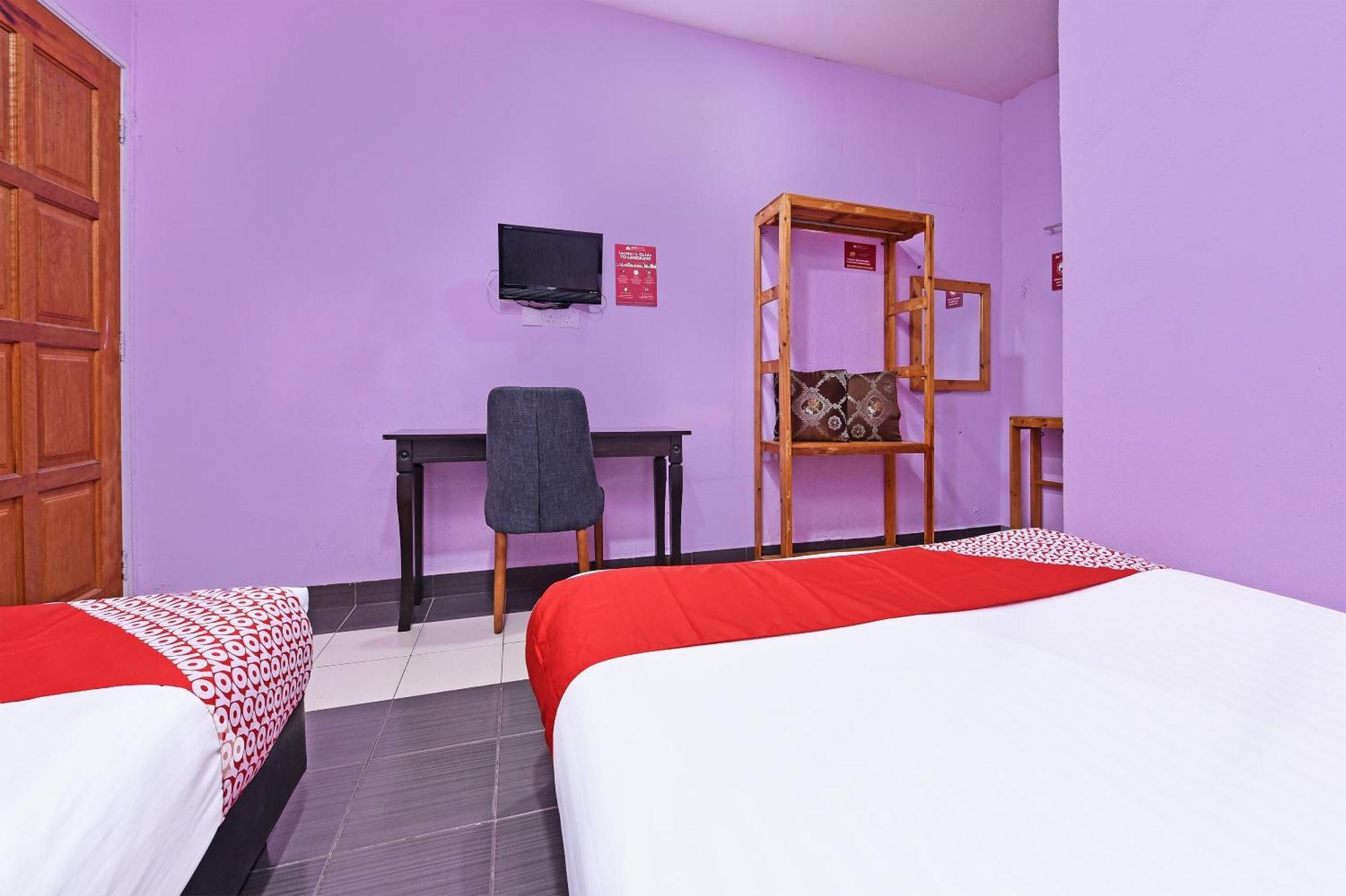 Oyo 90561 Awan Biru Motel Pantai Cenang  Dış mekan fotoğraf